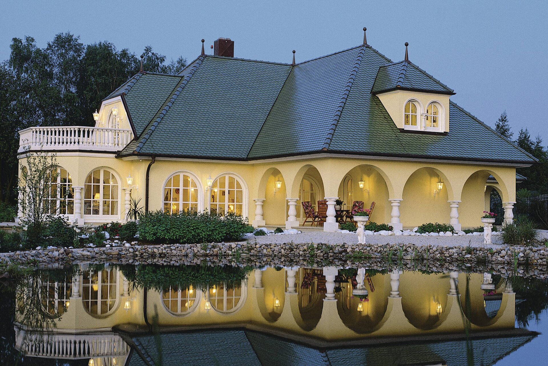 Luxury timber frame house with round arches